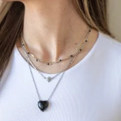 Delicate Star Necklace, Reconstituted Onyx -Alex And Ani Bracelets Shop gemstone heart necklace black on model layered AA7517BO23SS