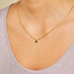 Harry Potter™ Deathly Hallows Slider Charm 12 Harry Potter™ Deathly Hallows Slider Charm -Alex And Ani Bracelets Shop harry potter deathly hallows slider charm on model AS21CYODHG